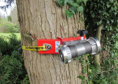 Red Soloclamp with Storz couplings on large tree 5