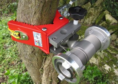 Red Soloclamp with Storz couplings on tree