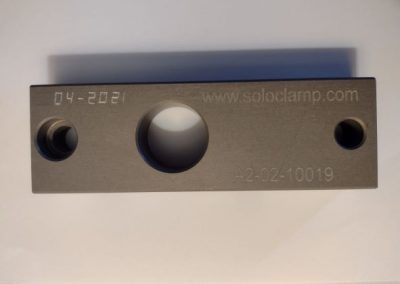 Top clamp with date of assembly model and unique serial number